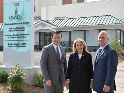 Mayor William J. Barlow Jr., SUNY Oswego President Deborah F. Stanley and Pathfinder Bank President Thomas W. Schneider, in front of the college’s new Business Resource Center