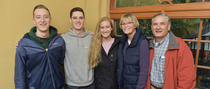 Daniel ’20 (left), Benjamin ’17 (second from left) and Polly Atkins Moretti ’85