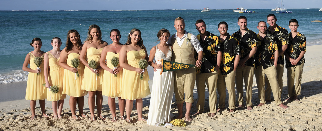 Pictured: Bryanna Duval '16 and Noah Lupini '16 with wedding party