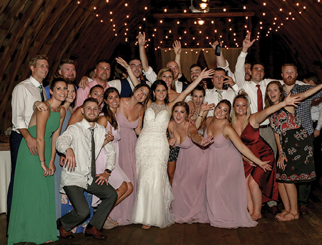 Pictured: Brianna Nichols ’14 and Shane LaChance ’13 with wedding party
