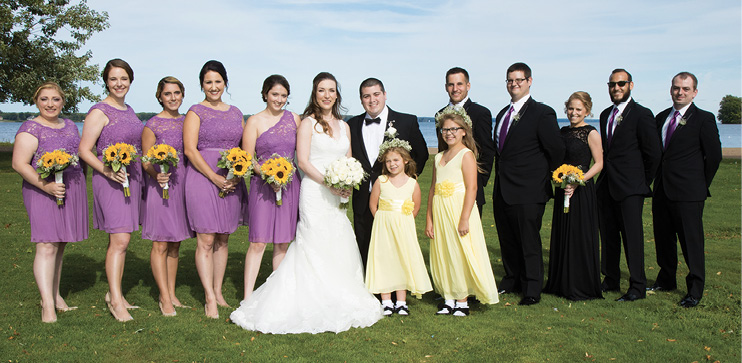 Pictured: Katy Osborn ’15 and Tyler Woods ’15 with wedding party