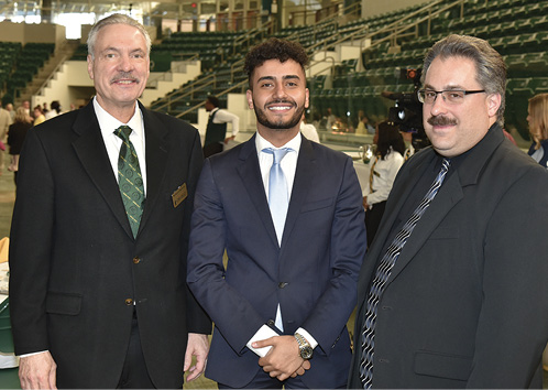 From left to right: Professor of Finance Dr. Richard Skolnik, Ahmed Albajari '19,Director of Student Involvement Michael Paestella