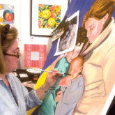 Mary Cottle Semallie '78 paints a portrait of her daughter and two grandchildren
