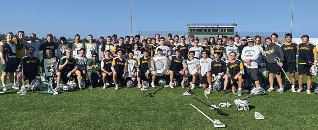 Men’s lacrosse players squared up for an alumni versus current players game during the program’s reunion weekend.
