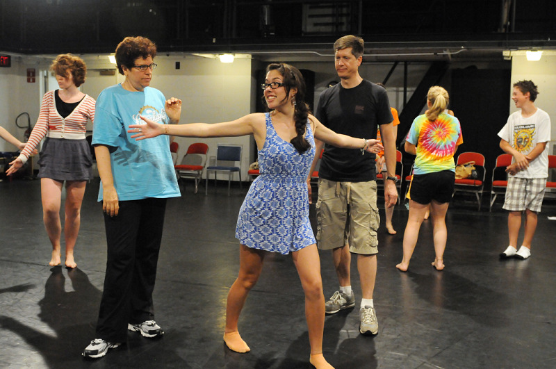 Acting instructor Shannon Penrod-Miller ’84 and director Kevin Kennison ’82 share some performance movement tips with Heather Ungerer, 14, during Summerfame on the Oswego campus. High school students from around the country came to campus July 18 to 30 for the two-week institute in musical theatre. “I got so much out of [the theatre] program that of course I want to give back to it,” said Kennison, an independent casting director based in New York City and interim head of the BFA program in acting at Brooklyn College. “It’s not a camp, but a pre-college training program,” he said, since the program gives students a very realistic view of the foundation of skills and learning they will need to succeed in musical theatre. Calling the program “important for Oswego and the next generation of artists,” he said that Summerfame gives Oswego the opportunity to attract strong students who will come to campus to see what the college has to offer. Planning is already under way for a summer 2011 version of the program, he added.