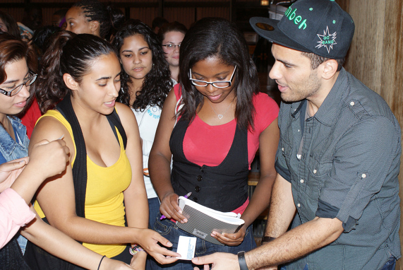 Students flock around poet/musician Oveous Maximus, right, for pictures and autographs in Hewitt Union Ballroom during the 2010 ALANA (African, Latino, Asian, Native American) Conference. Maximus, a rapid-fire spoken-word poet, was the keynote speaker for the weeklong conference. “This was amazing,” Quindell Williams ’11 said. “The spoken word, it’s something different, something close to home and close to our age. I thought it was great.” ALANA, now in its 24th year, has become a staple in promoting a multicultural environment at SUNY Oswego and is a consistent hit among students, faculty and administrators.