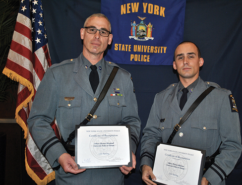 Officers Thomas Woodruff ’88 (left) and Thomas Marrone of University Police at SUNY Oswego