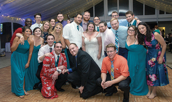 Pictured: Stephanie Gibney ’14 and Dan Amorese ’14 with wedding party.