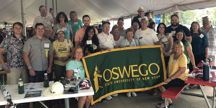 Pictured: Alumni and friends from SUNY Oswego, as well as SUNY Brockport, SUNY Cortland, SUNY Geneseo and SUNY Plattsburgh, at the Races in Saratoga Springs, NY. 