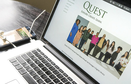 Quest website on laptop